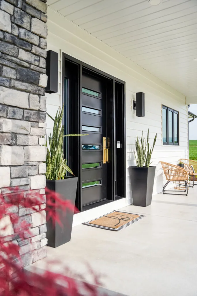 Modern entry door installed by landmark