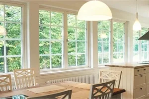 large casement windows filling a living room with natural light